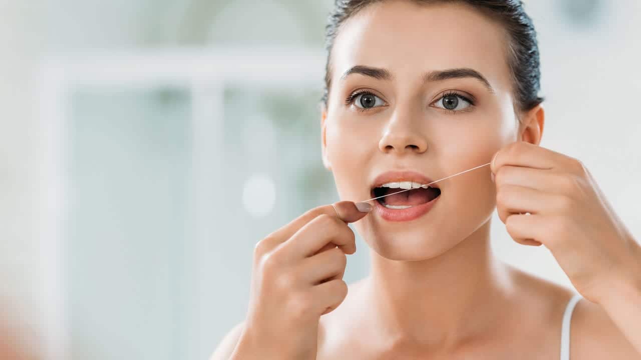 The Link Between Poor Flossing and Gum Disease Worthing